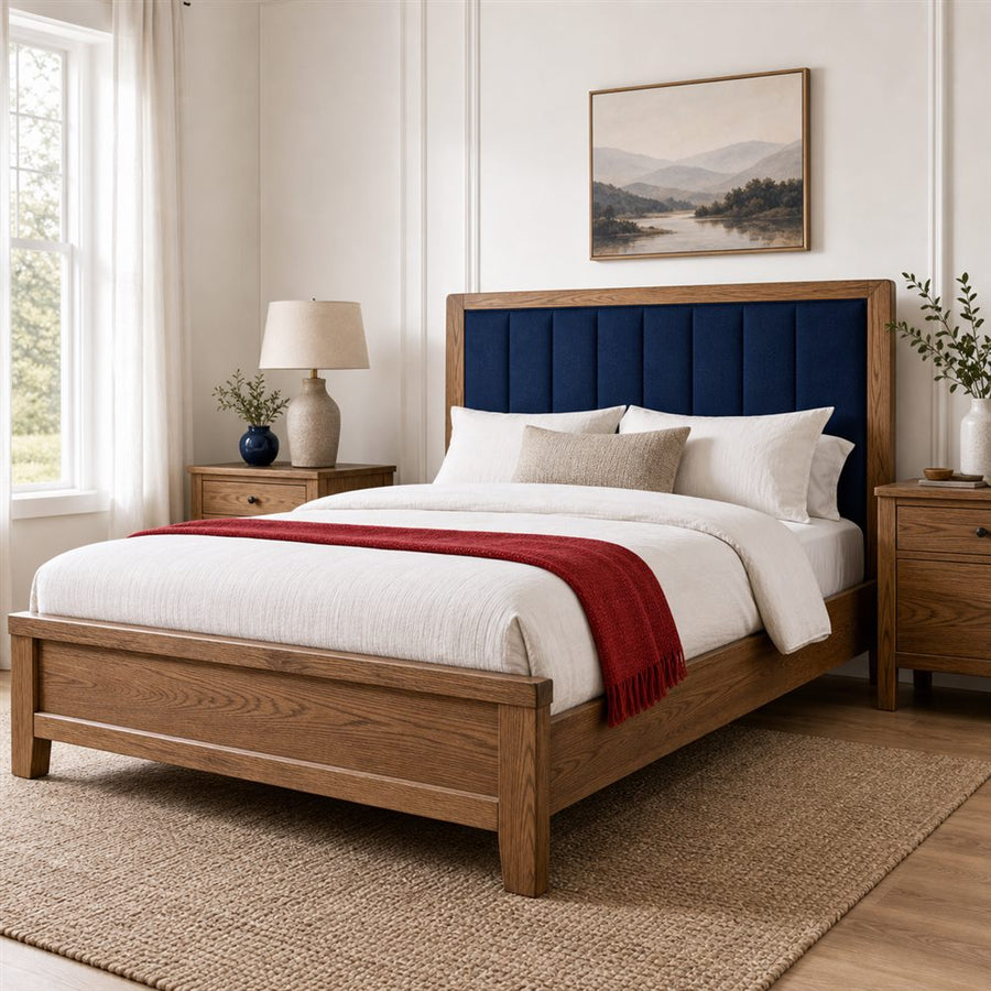Liberty oak-finish bed with an upholstered headboard